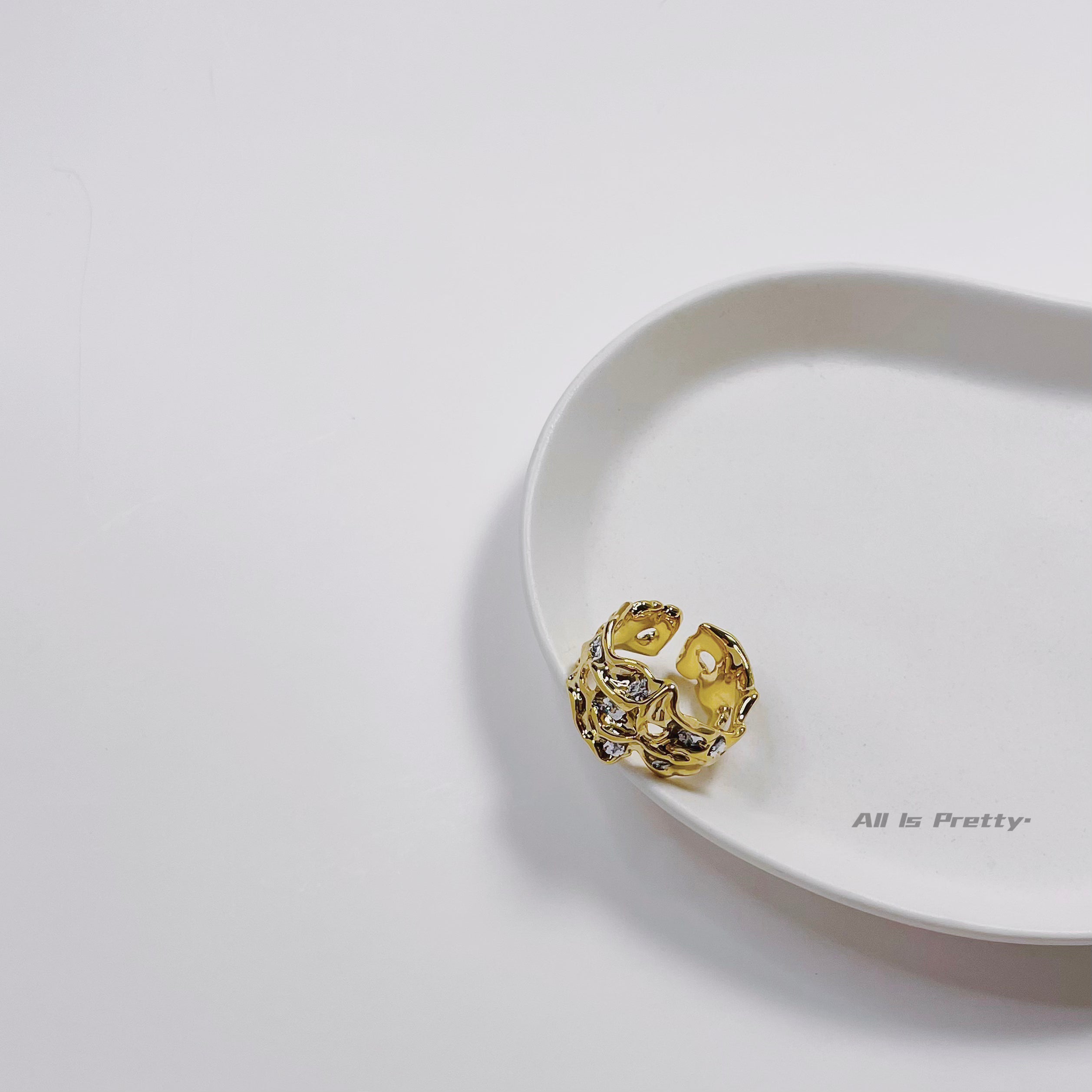 Textured crown open ring